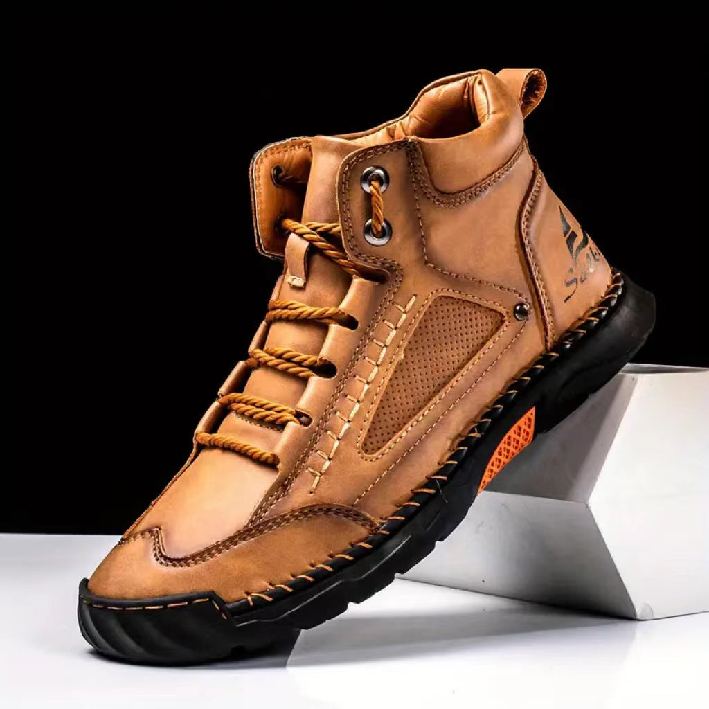 Brown leather hiking boot with rugged sole, orange laces, and breathable mesh panels for outdoor adventures